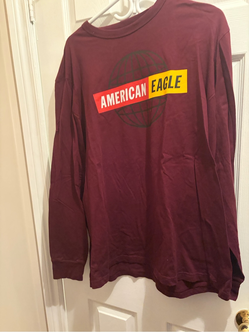 American Eagle Outfitters Long-Sleeve Tee in Maroon with Yellow & Red Logo